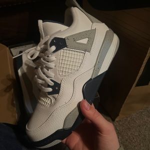 Navy blue jordan retro 4